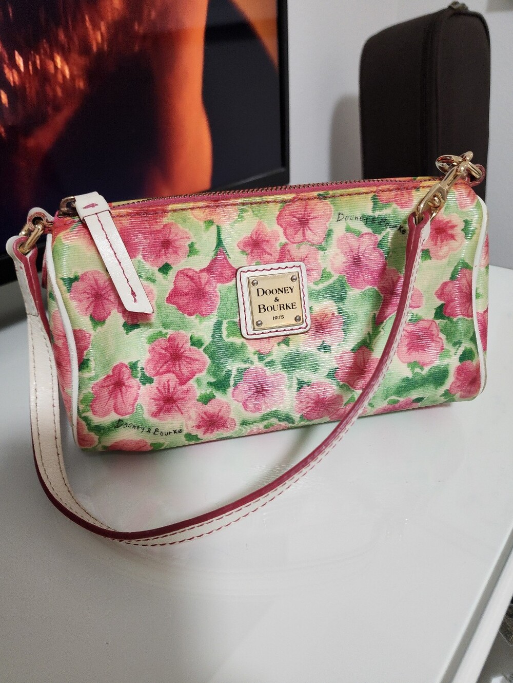 Dooney & Bourke Pink Floral Wristlet with Green Accents